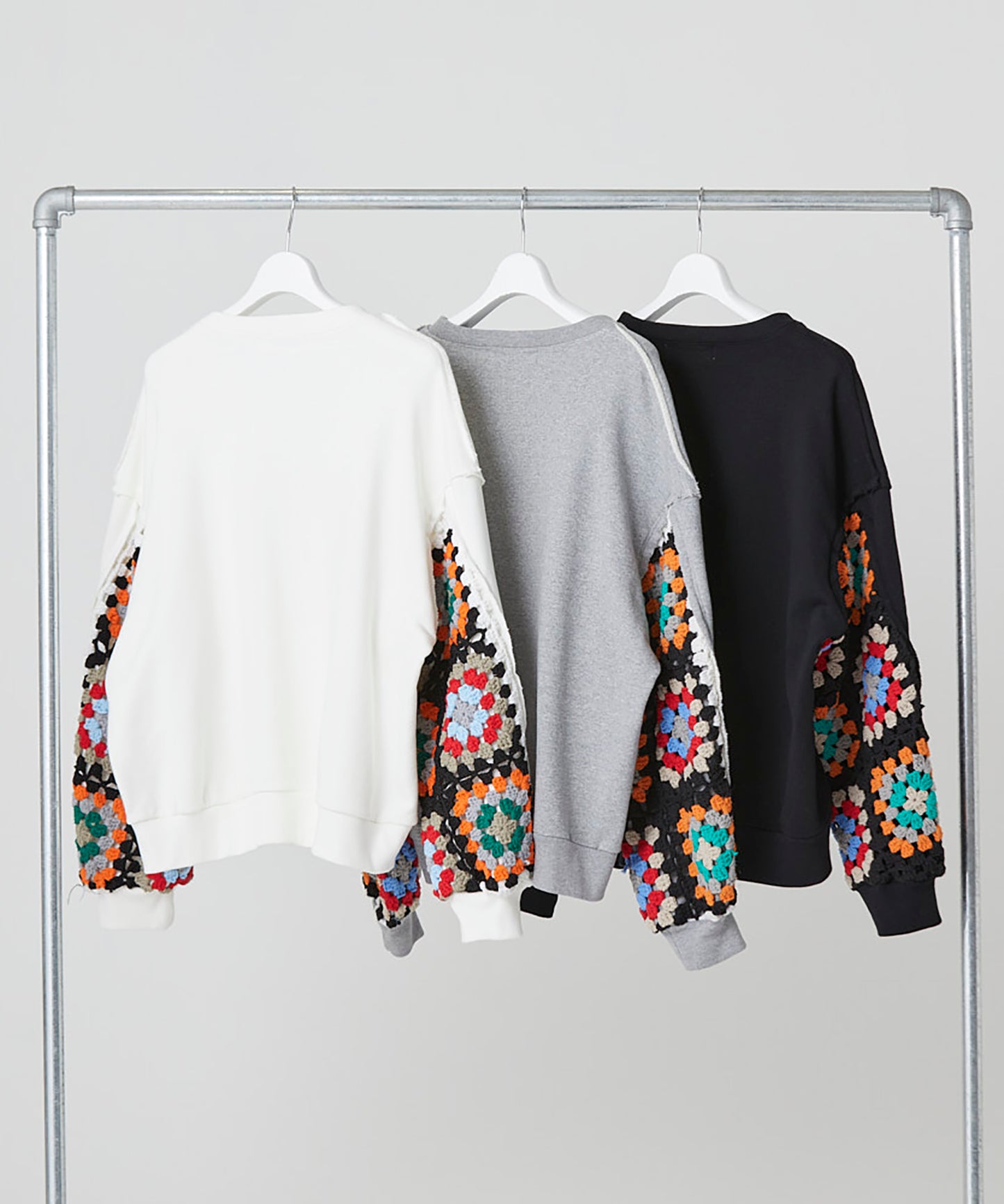 CROCHET SLEEVE SWEAT