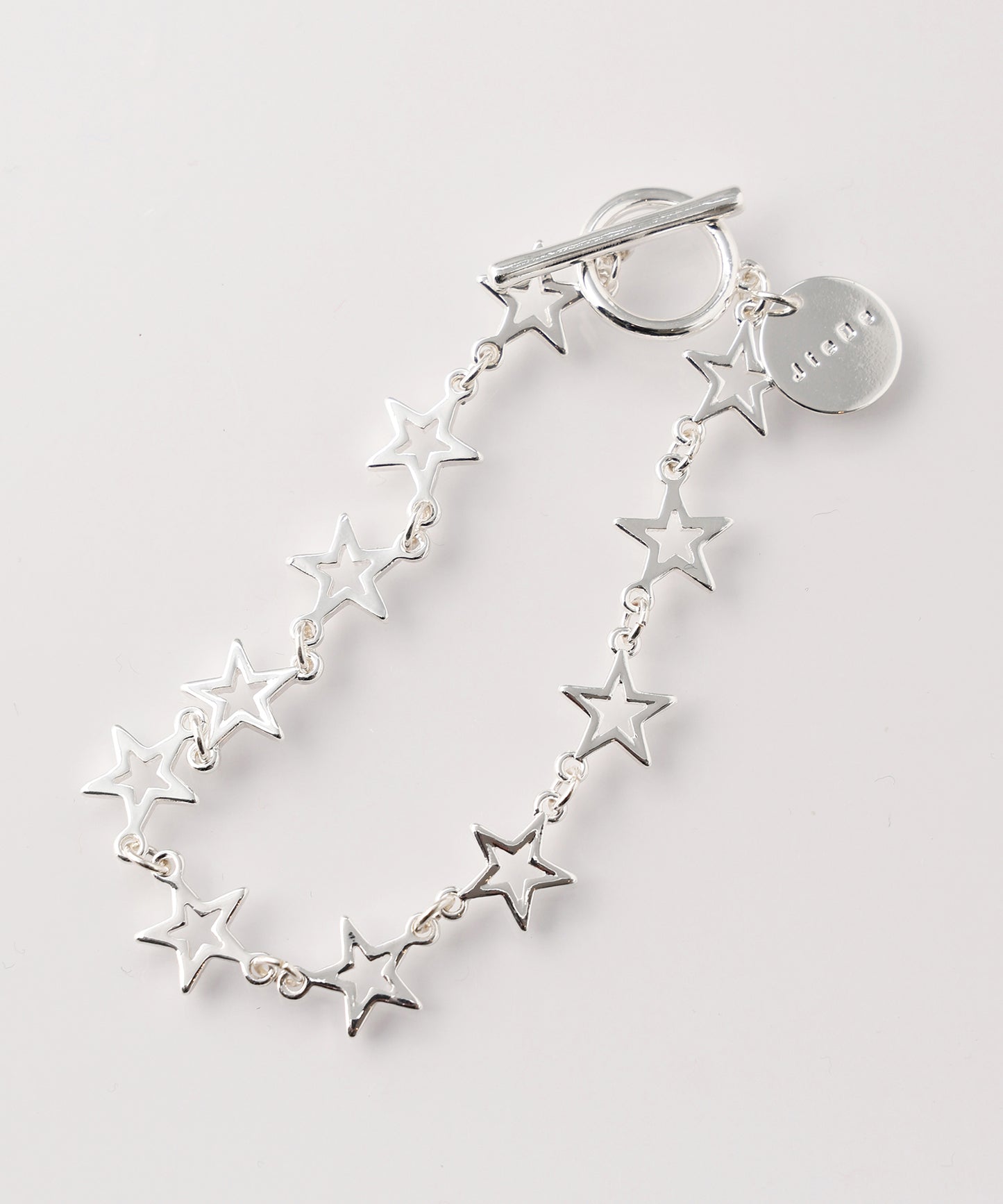 SMALL OPEN STAR BRACELET