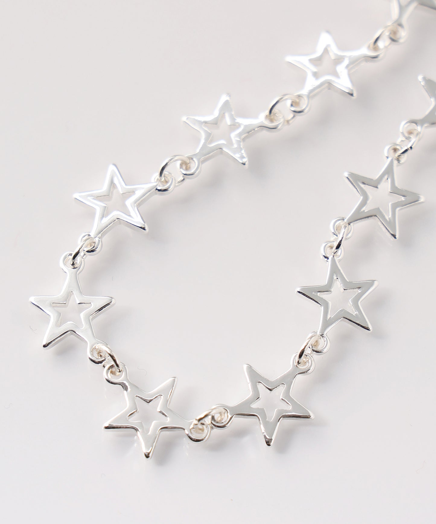 SMALL OPEN STAR BRACELET