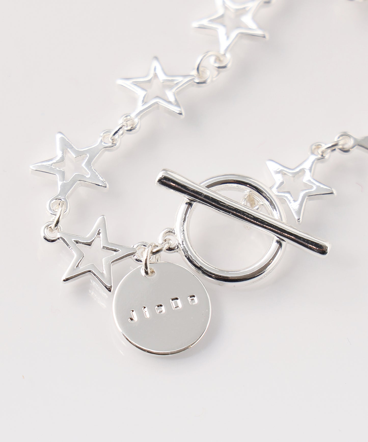 SMALL OPEN STAR BRACELET