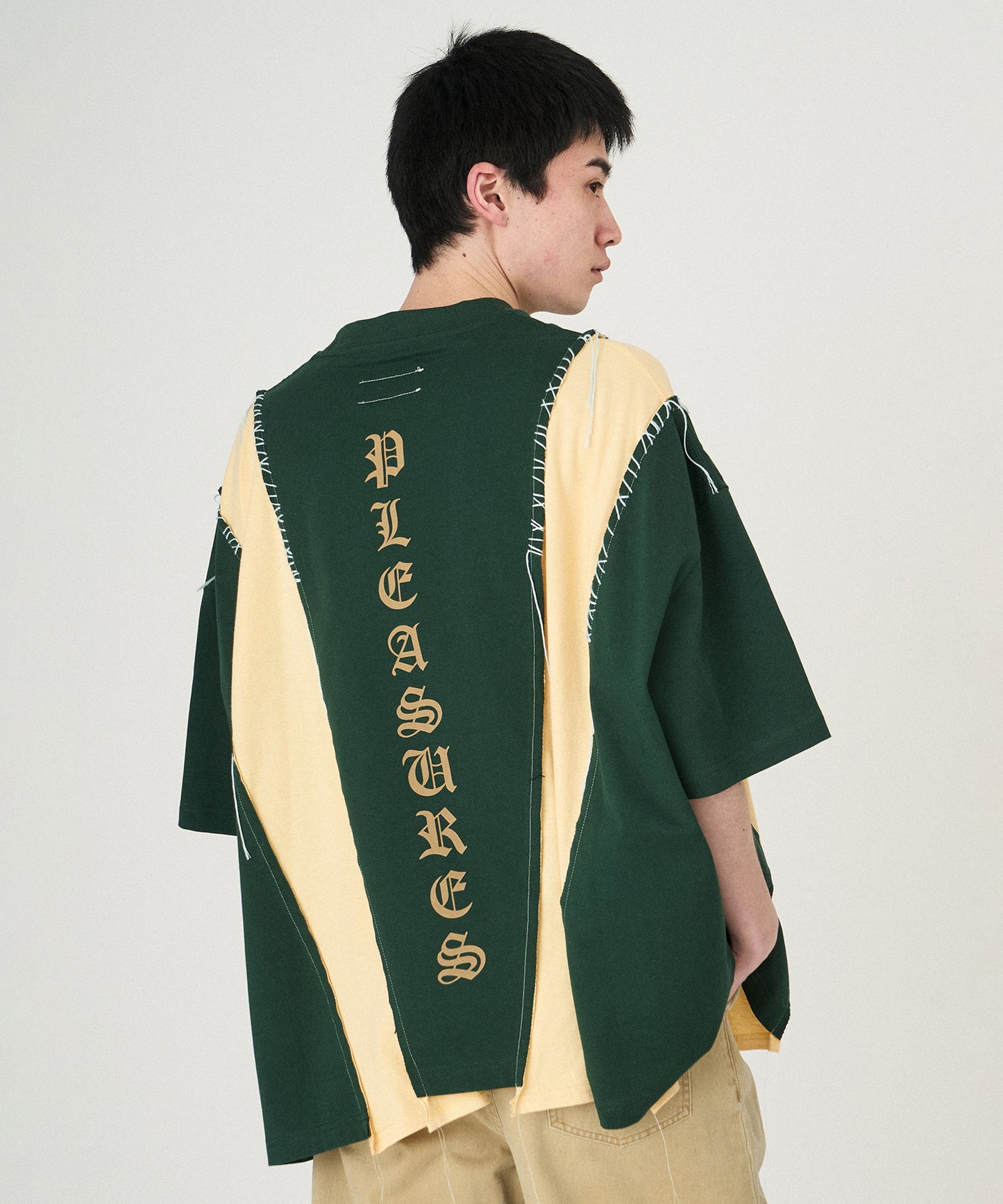 PLEASURES x DISCOVERED DOCKING WIDE TEE