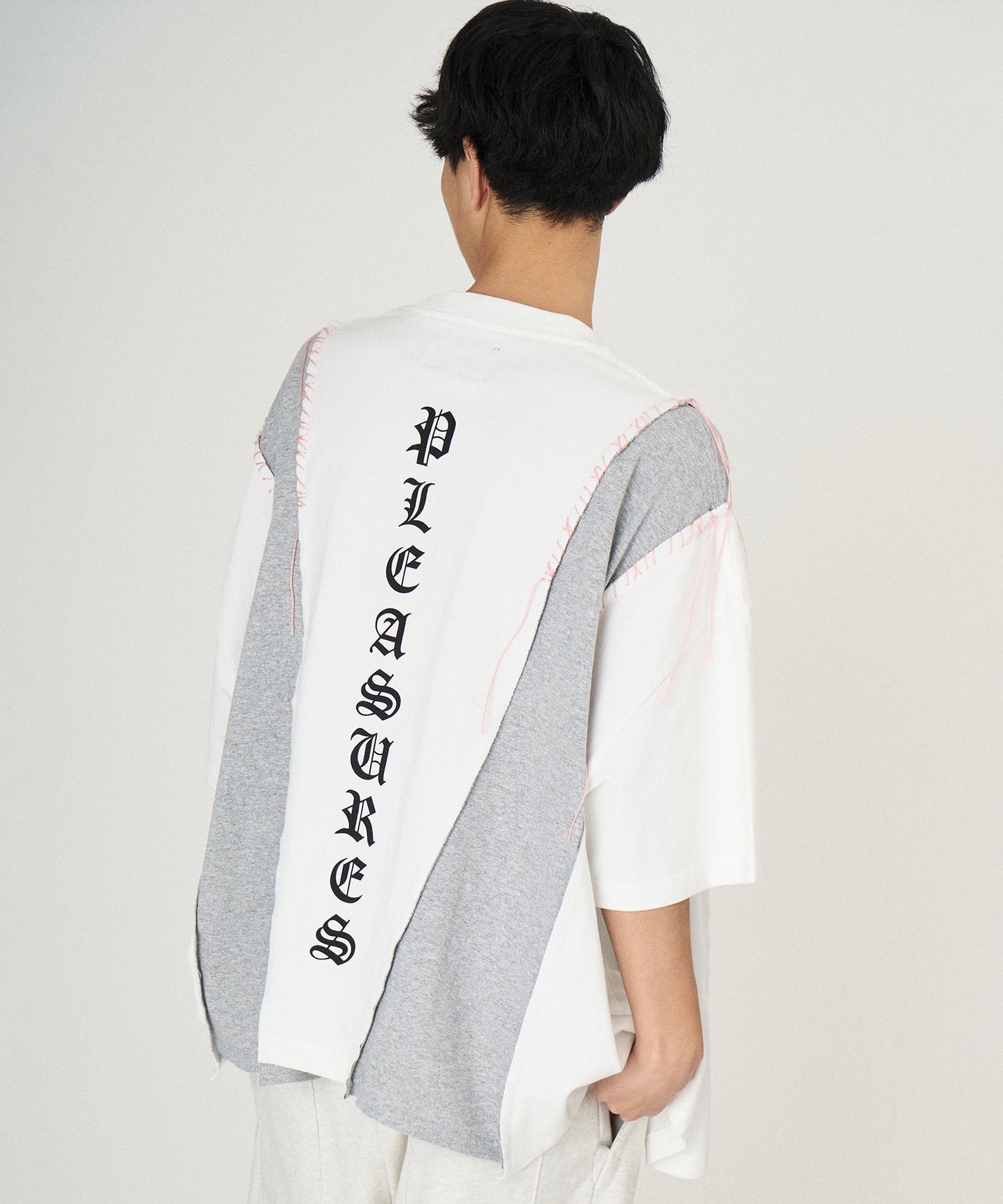 PLEASURES x DISCOVERED DOCKING WIDE TEE