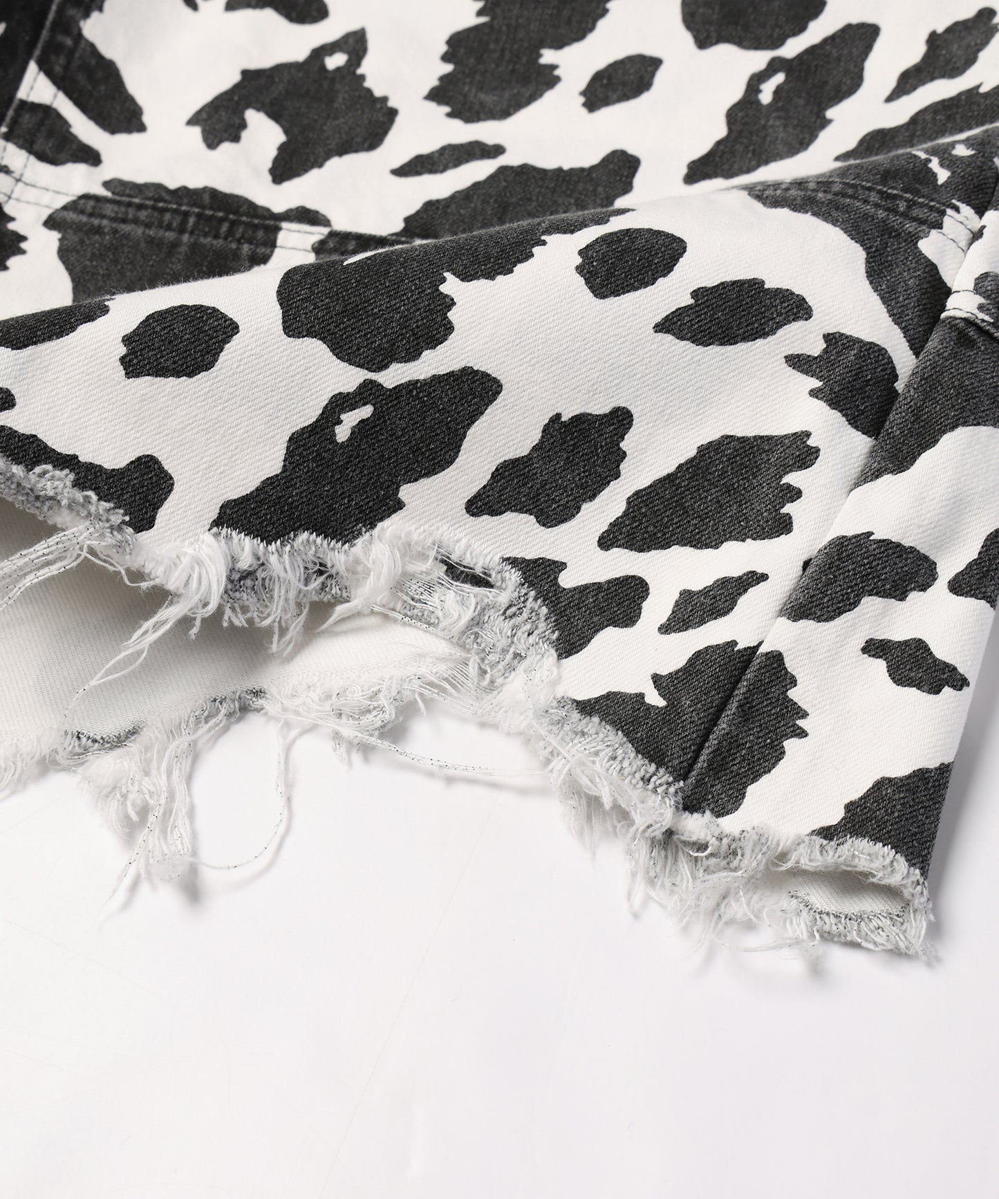 COW PRINT DOUBLE KNEE SHORTS