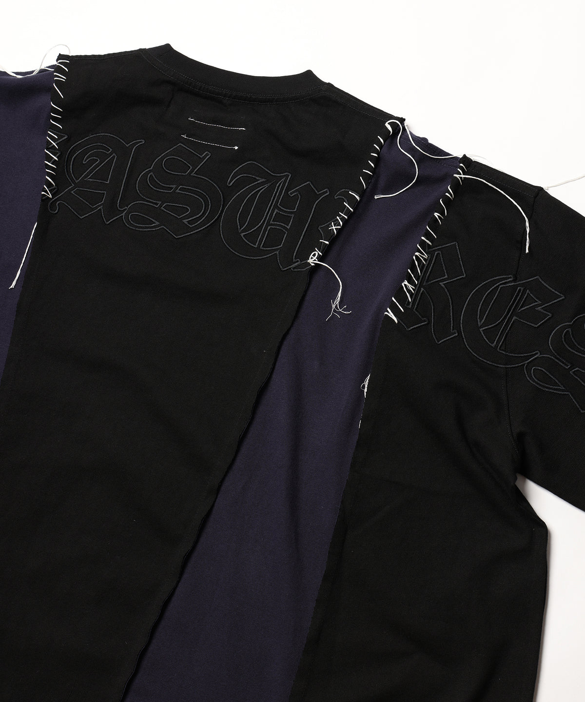 PLEASURES x DISCOVERED DOCKING WIDE TEE