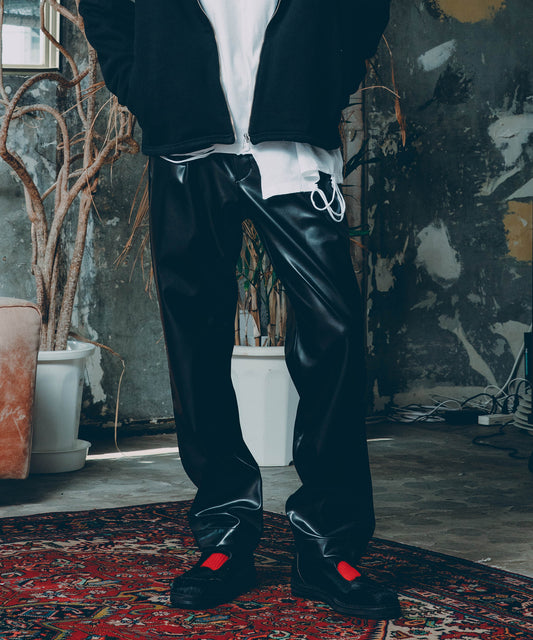 vegan leather tapered slacks