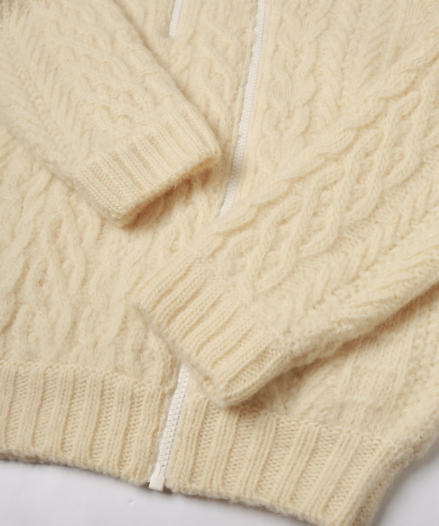 CABLE ZIP KNIT