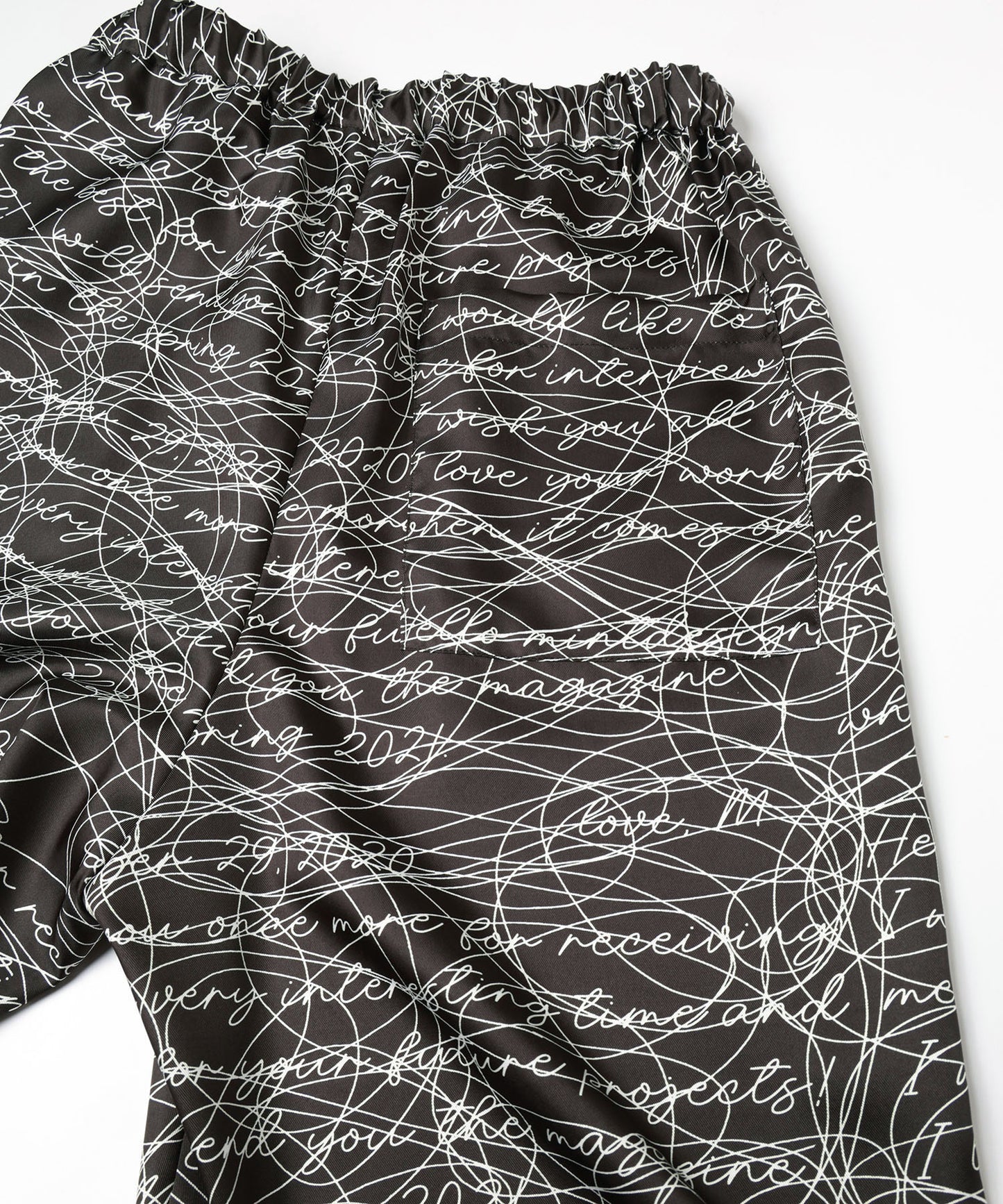 INK LETTER GATHER PANTS
