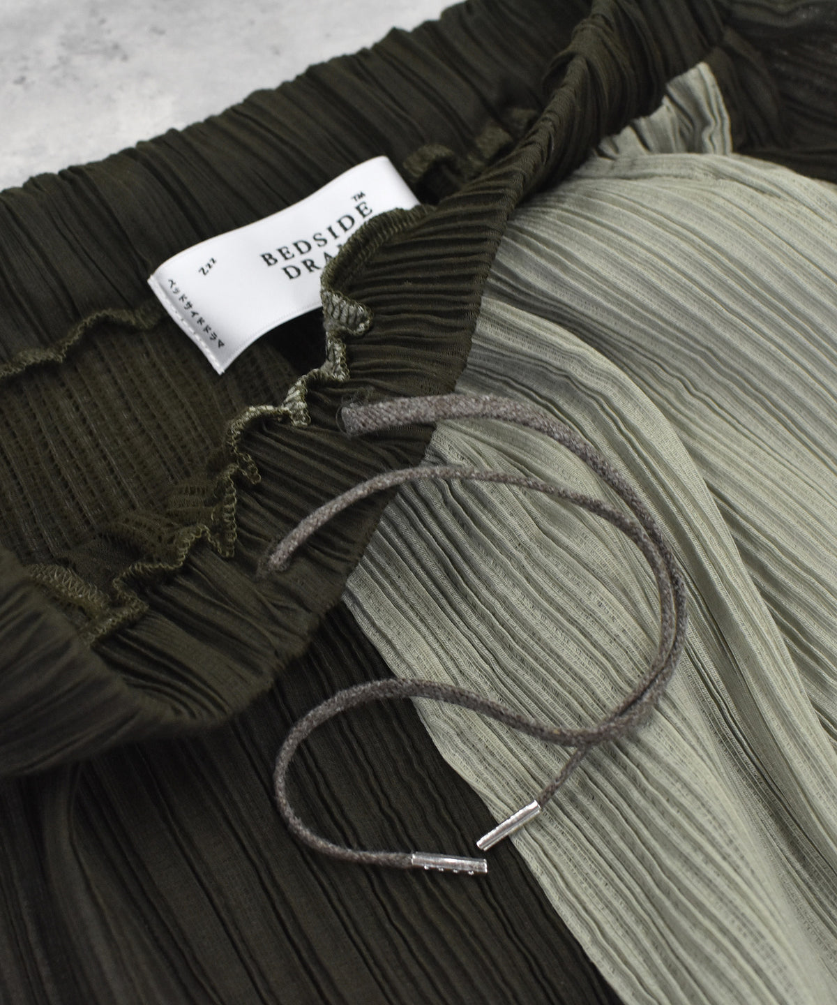 RELAXED PLEATED PANTS
