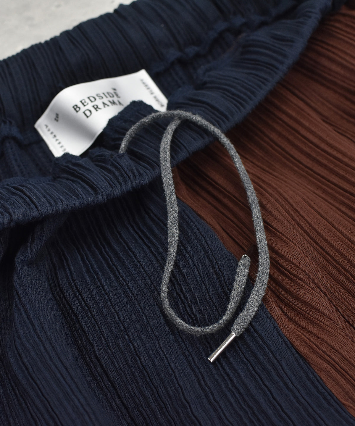 RELAXED PLEATED PANTS