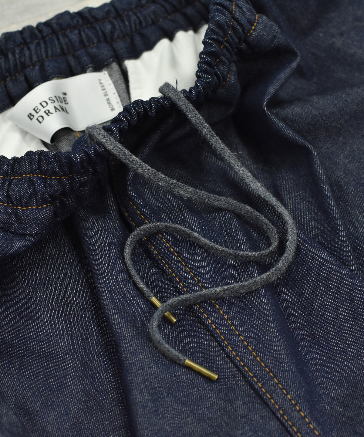 GATHERED DENIM PANTS