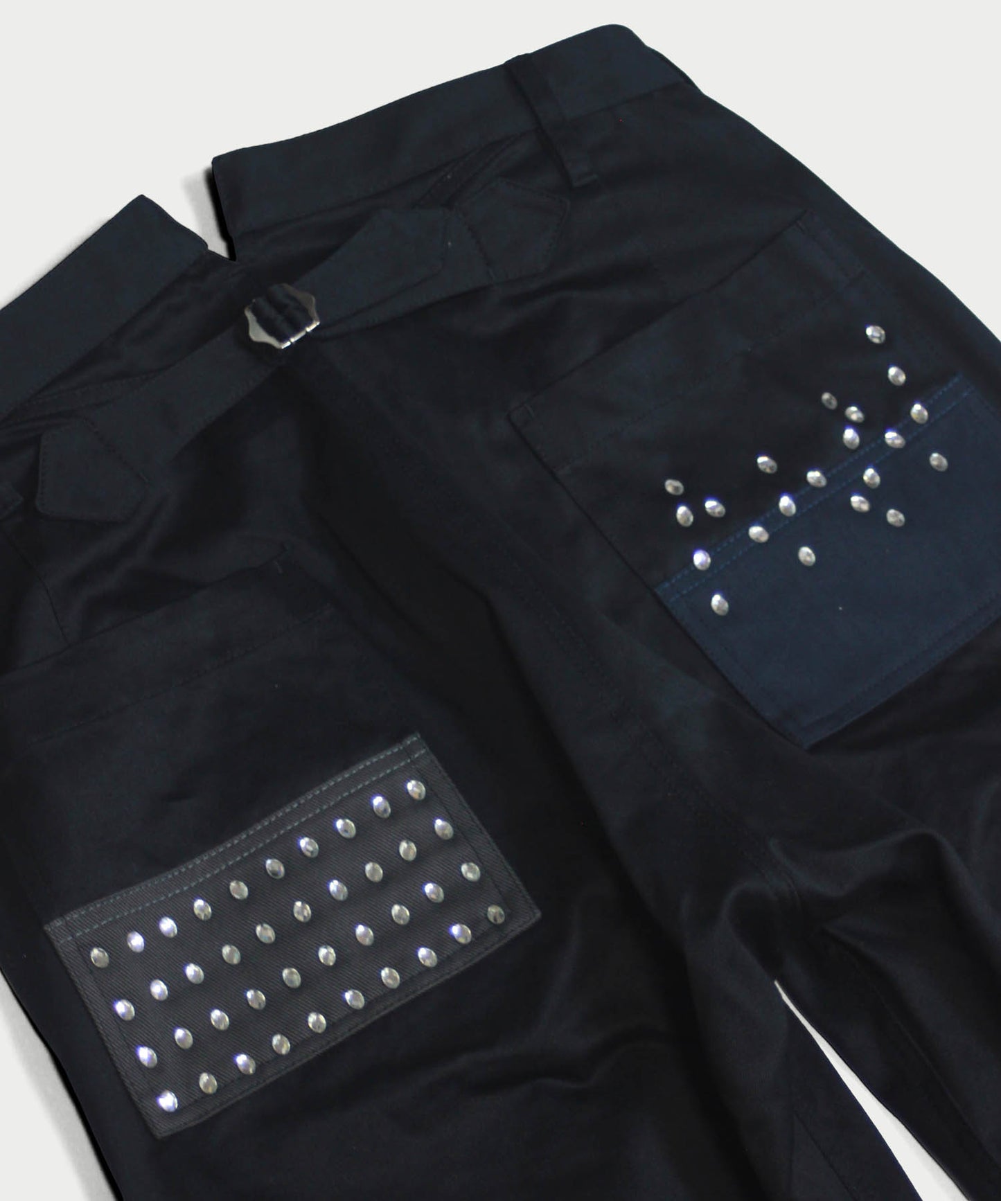 STUDS PATCHED PANTS